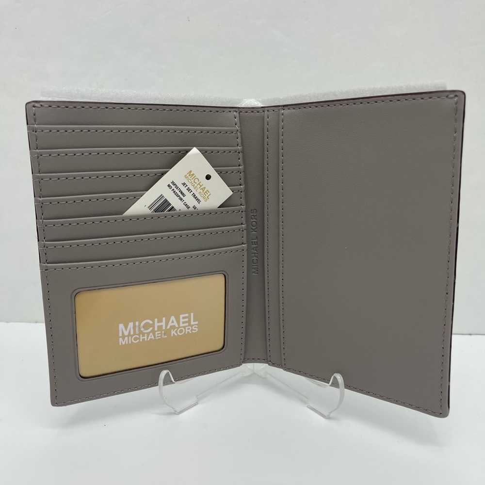 Michael Kors Jet Set Travel Md Sign Patent Logo Debossed  Passport Case
Silver - Picture 3 of 16